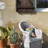 White rattan armchair