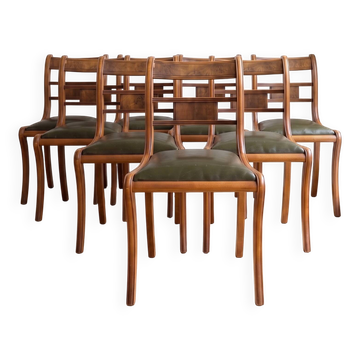 Set of 14 vintage chairs in solid wood and green leather.
