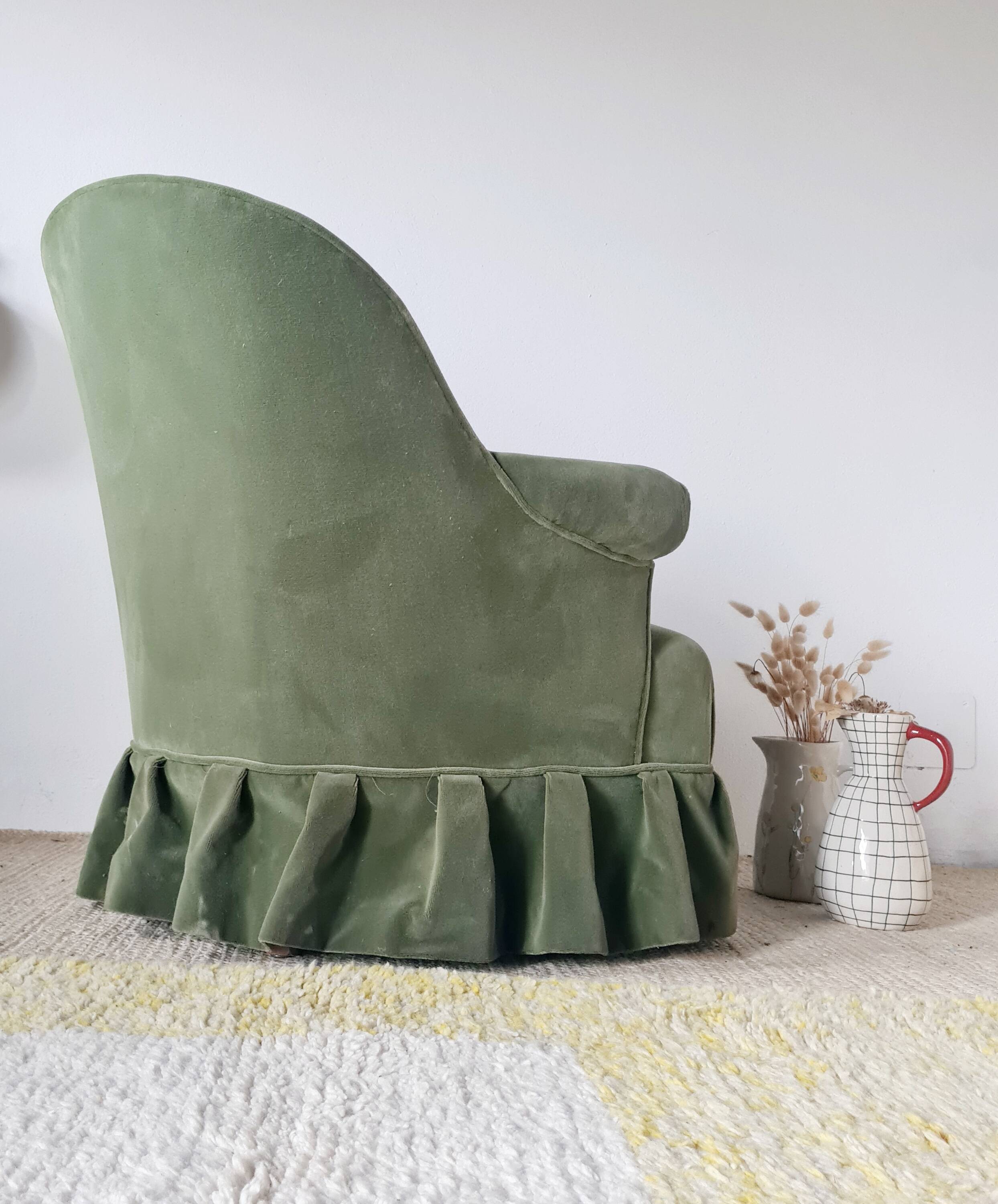 Green velvet armchair