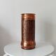 Vintage brutalist umbrella stand in hammered copper with a wood effect.