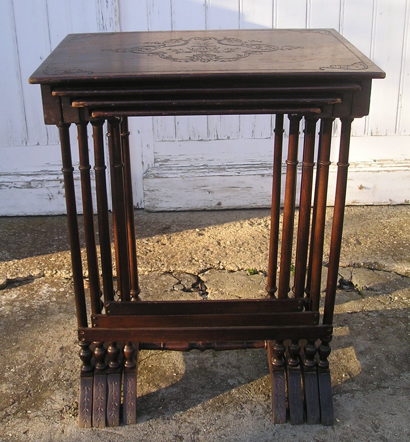 Set of 4 old tables with carved trays