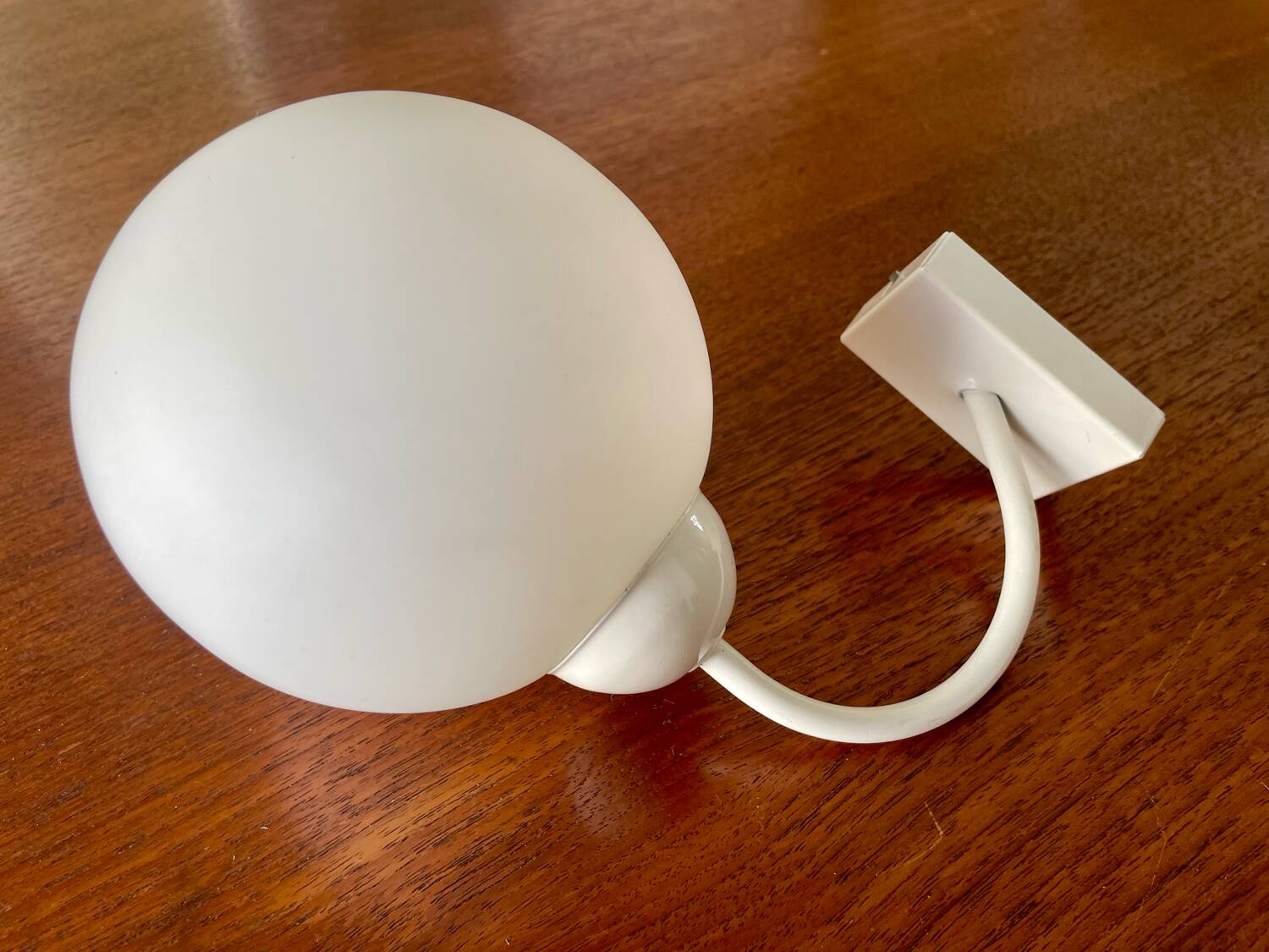 White metal wall light and opaline ball