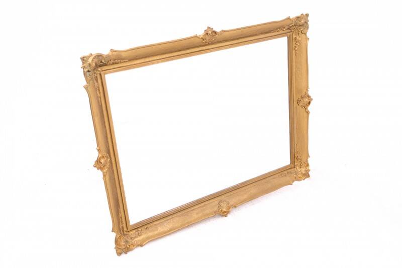 Horizontal mirror in gold frame, France.