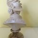 Bust of a young woman in the hat of A. Giannelli
