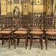 Suite de 8 chaises de bistrot en cannage FISCHEL