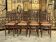 Suite de 8 chaises de bistrot en cannage FISCHEL