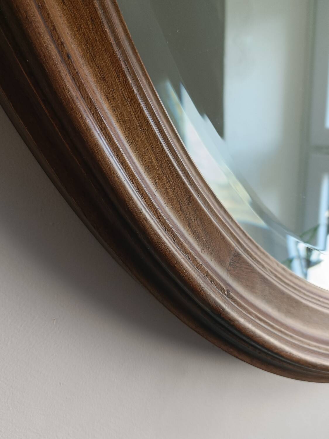 Antique oval beveled mirror