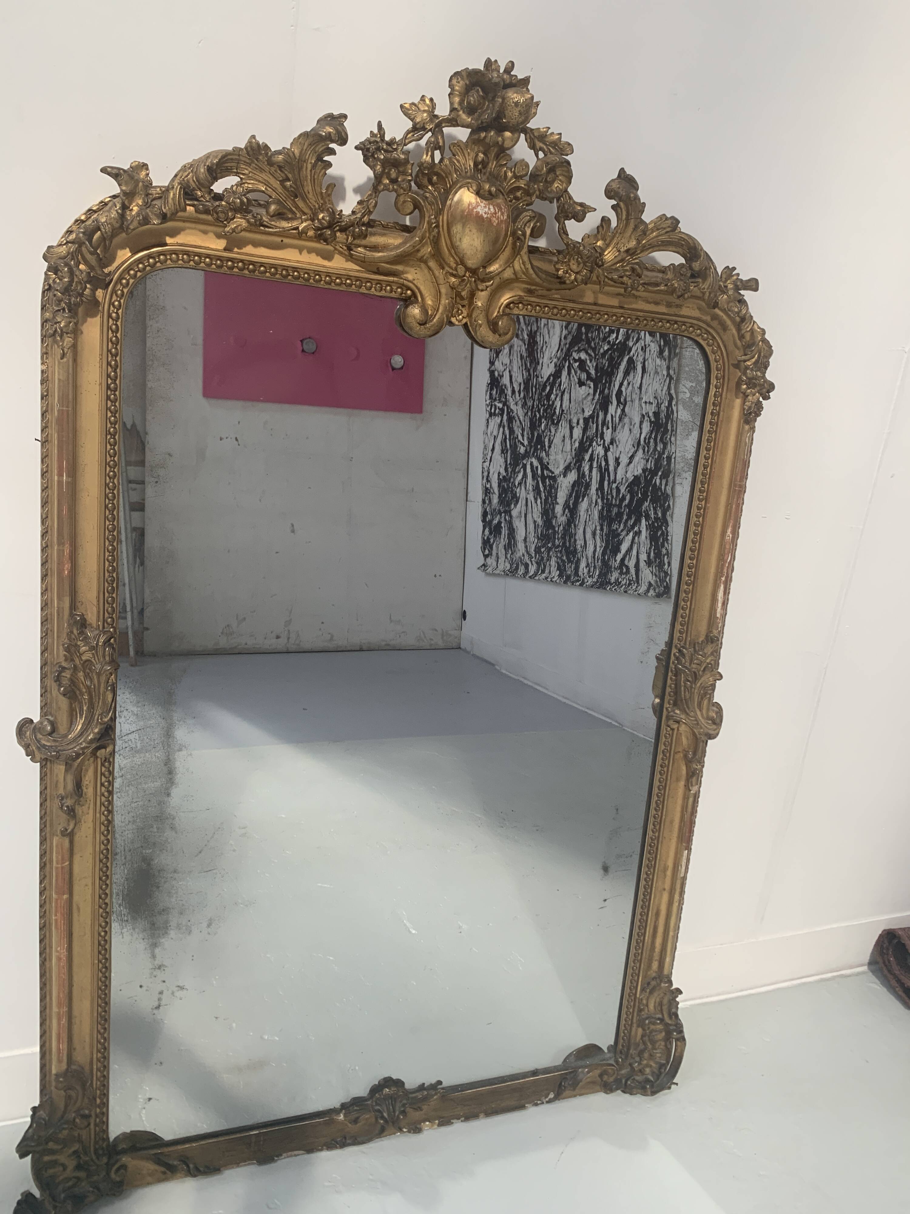 Louis XV style mirror in wood and gilded stucco, 19th century