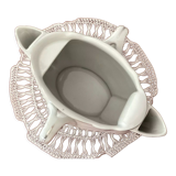 Old porcelain saucepan with fat/lean separator