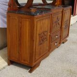 Solid walnut sideboard, moustache legs, black marble top.