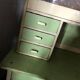 Vintage wooden kitchen cupboard painted green and beige, with glass doors - 1930s