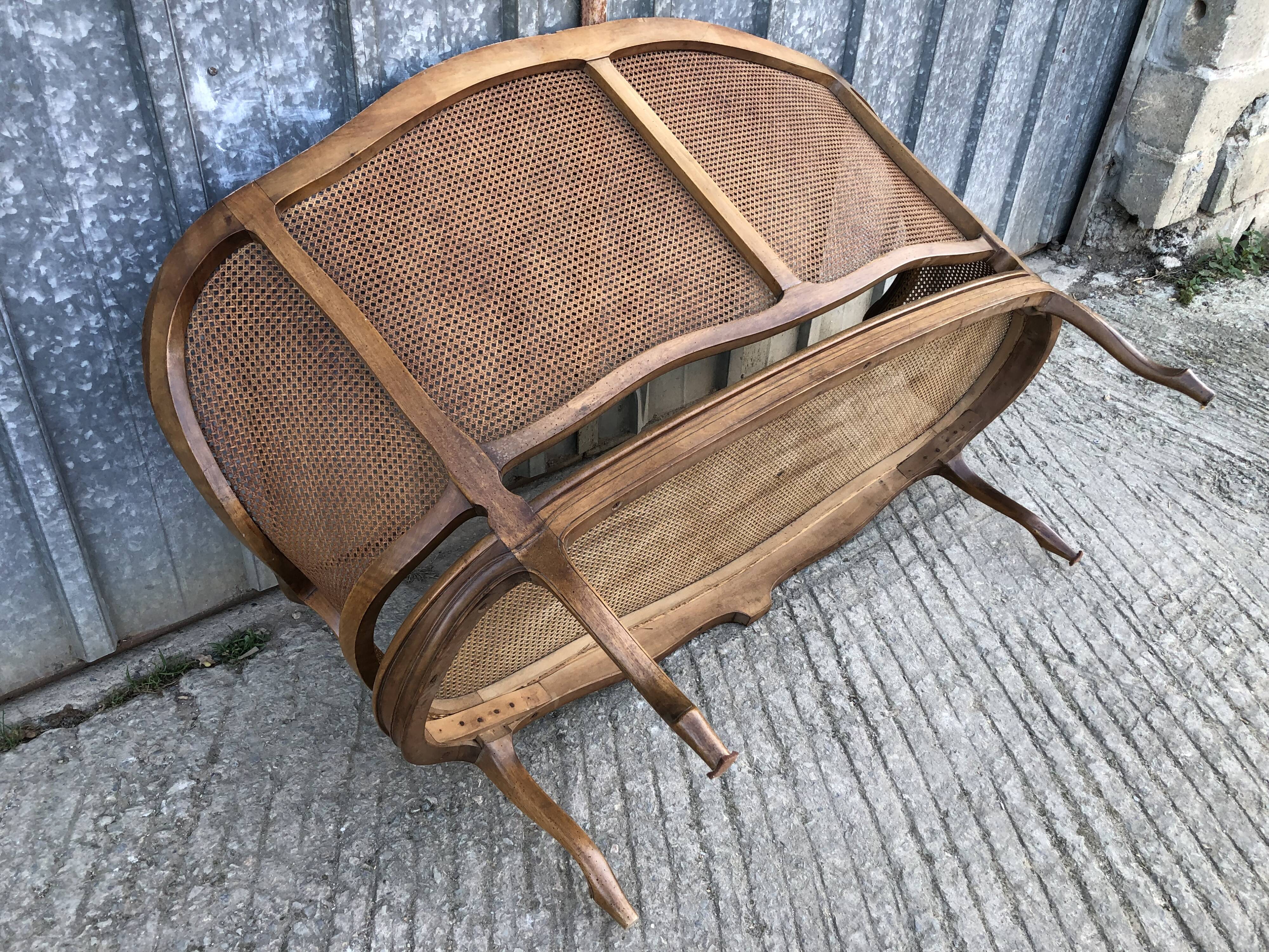 Antique Louis XV bench in solid walnut and caning