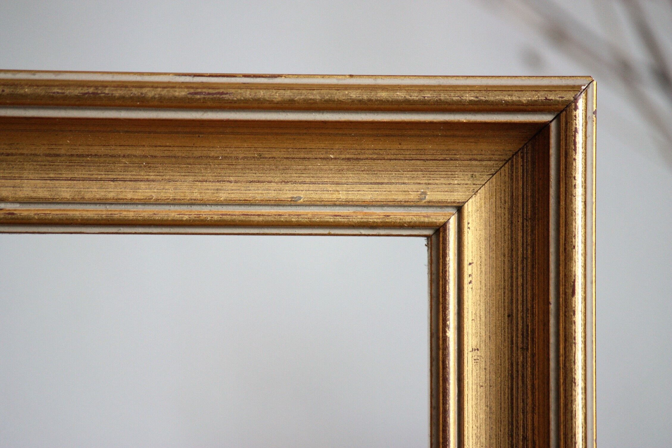 Moulded gilded wood frame