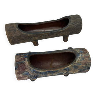 Lot of sandstone planter in the shape of logs