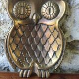empty brass owl pocket