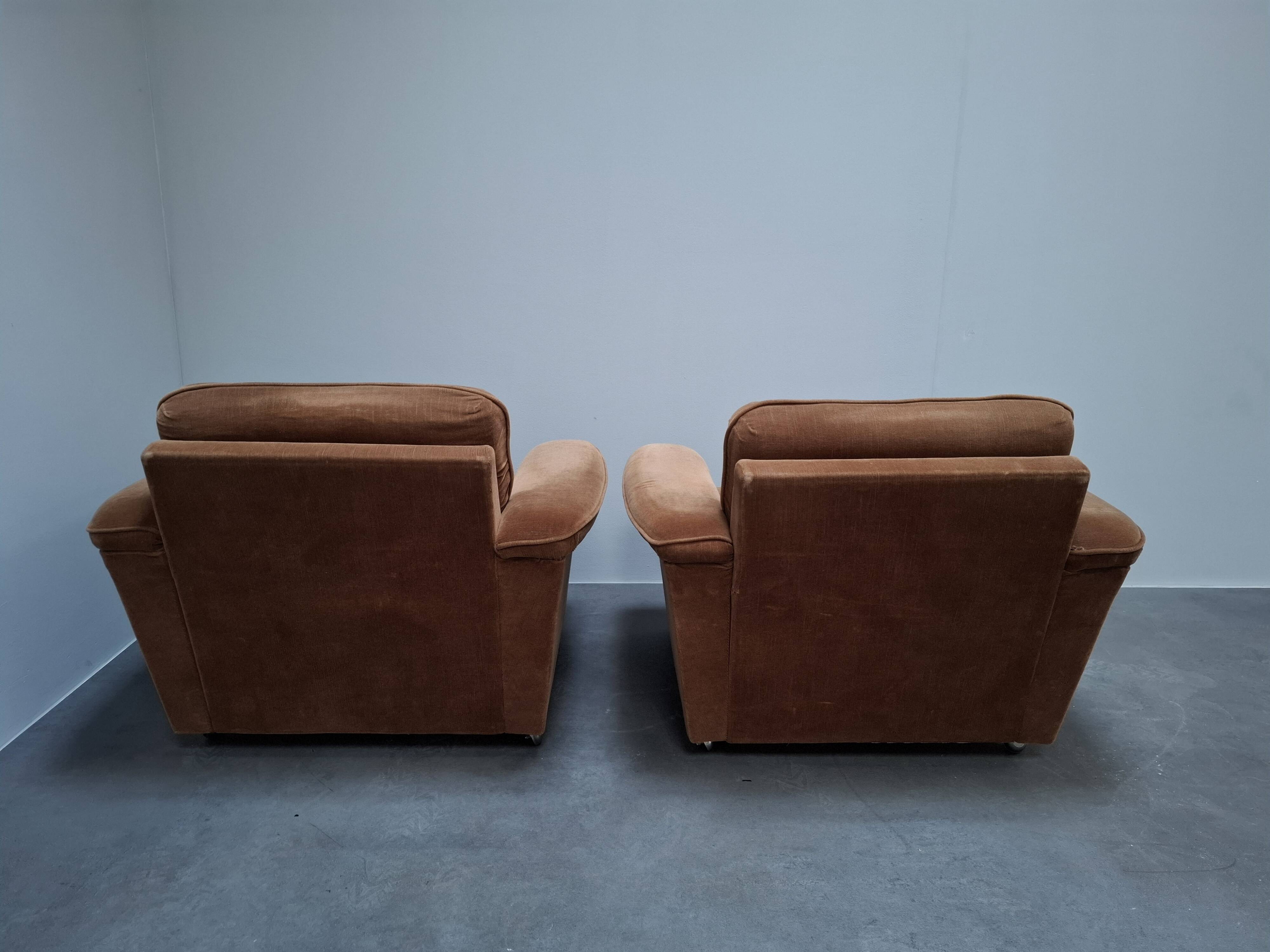 Pair of Mid-Century Modern Czech Lounge Armchairs with Rolling Casters