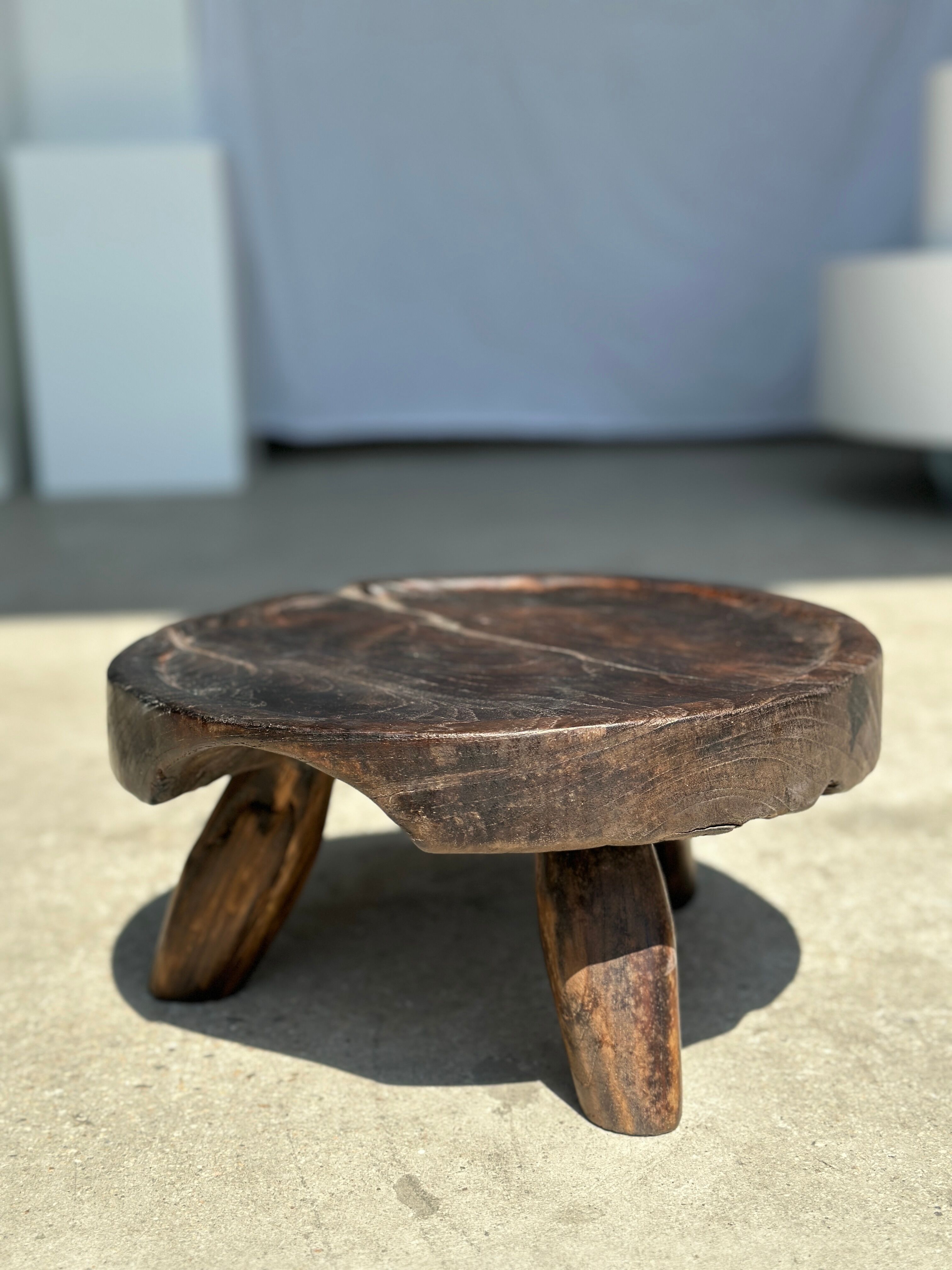 Small tripod stool low in dark brown upcycled teak