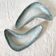 Pair of boomerang dishes signed in enamelled terracotta