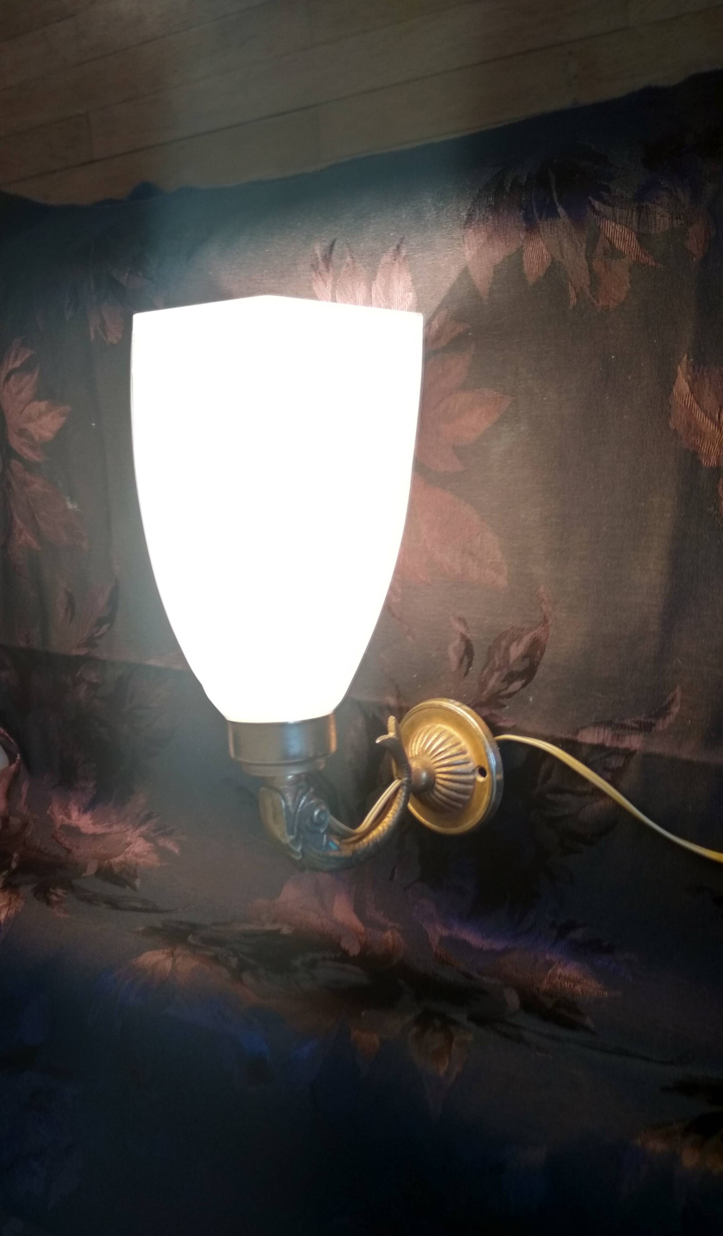 Golden brass wall light with glass tulip - dolphin pattern bathroom lamp