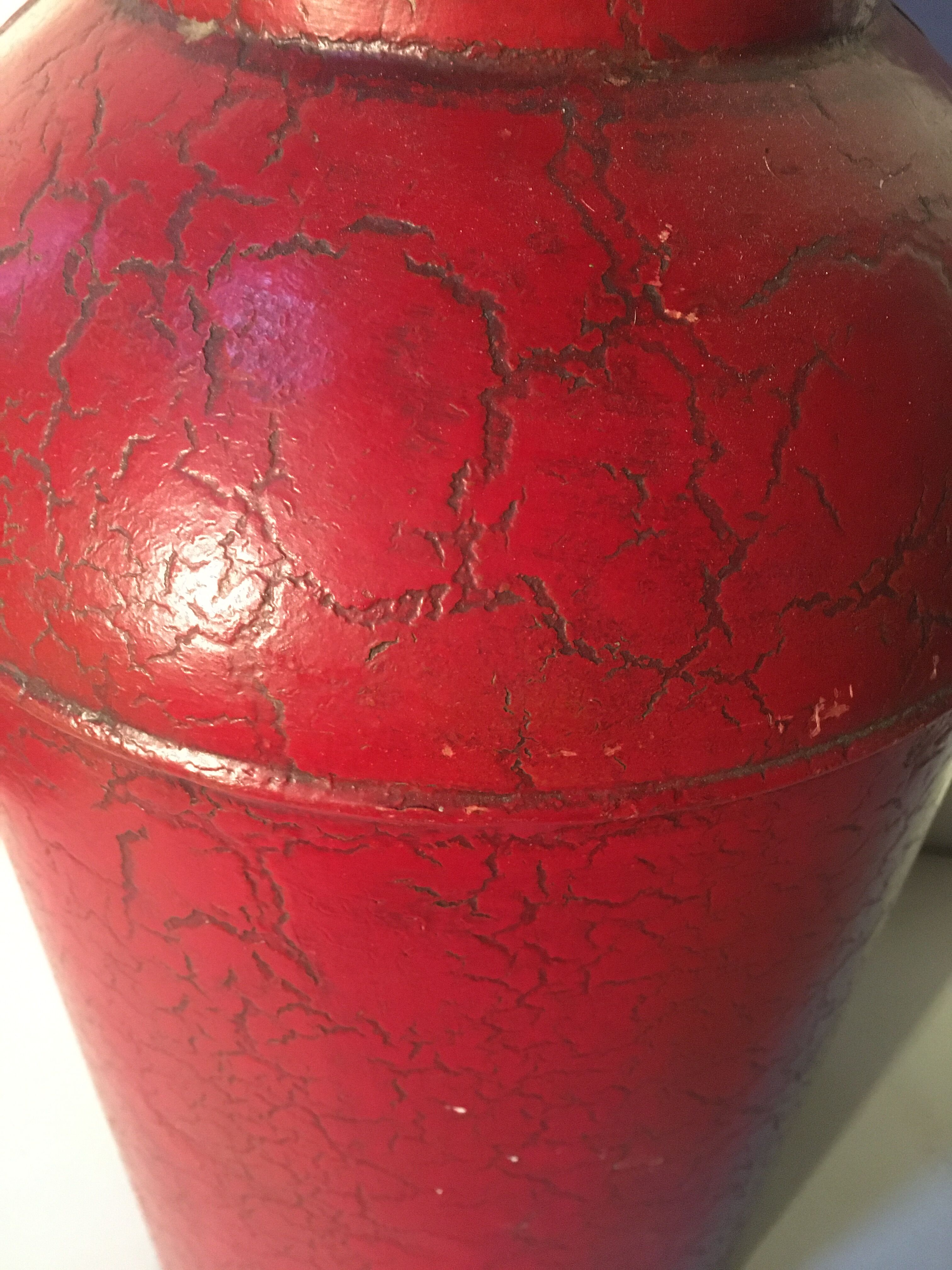 Asian red metal pot with lid