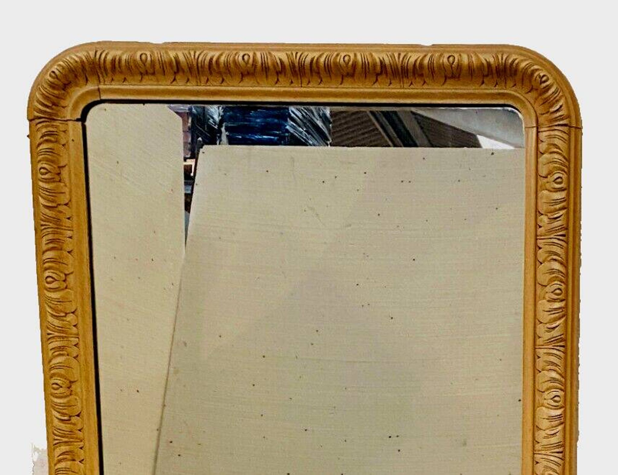 Louis Philippe mirror in wood and patinated stucco, 19th century.