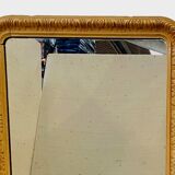 Louis Philippe mirror in wood and patinated stucco 19th century