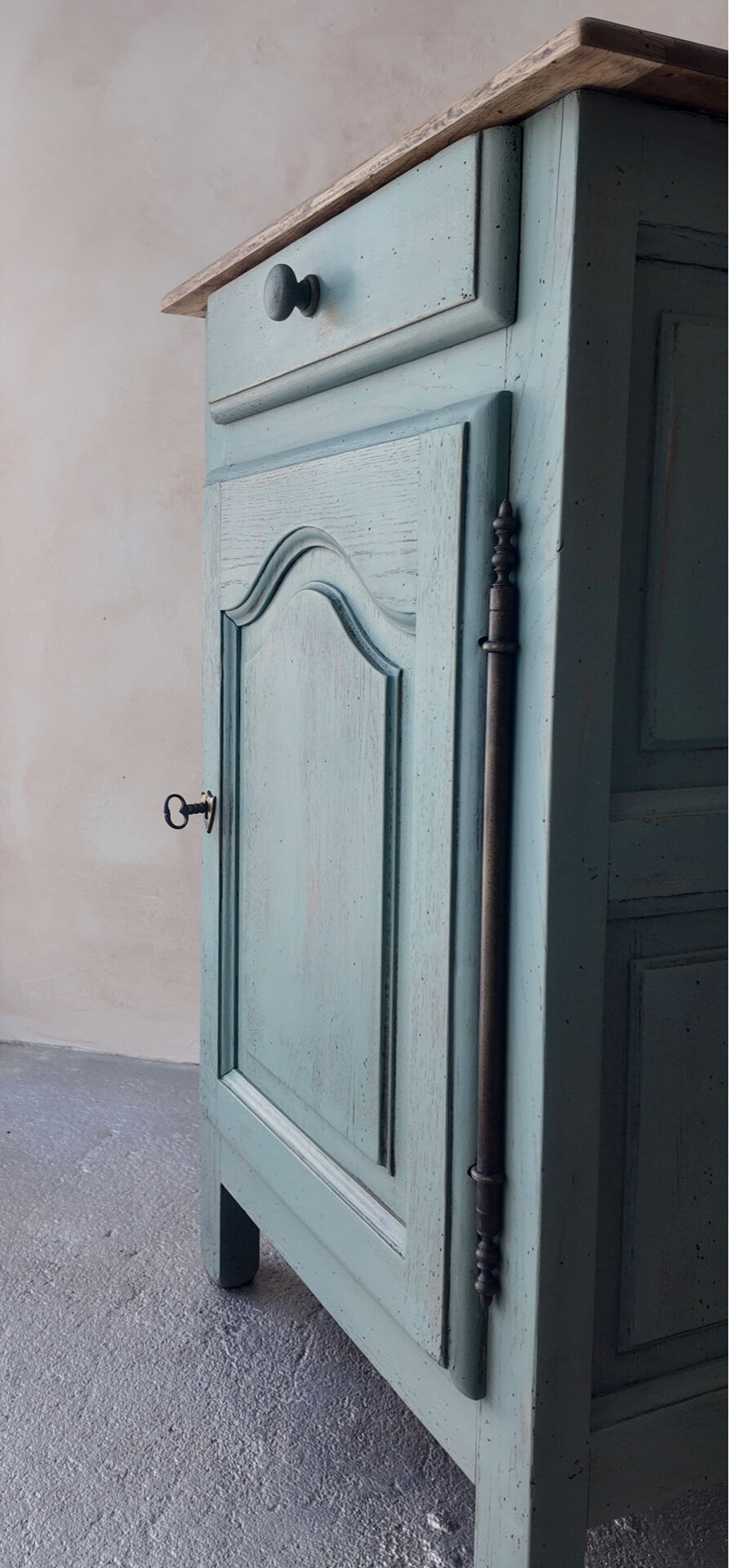Small vintage side table in sage green patina and solid wood.