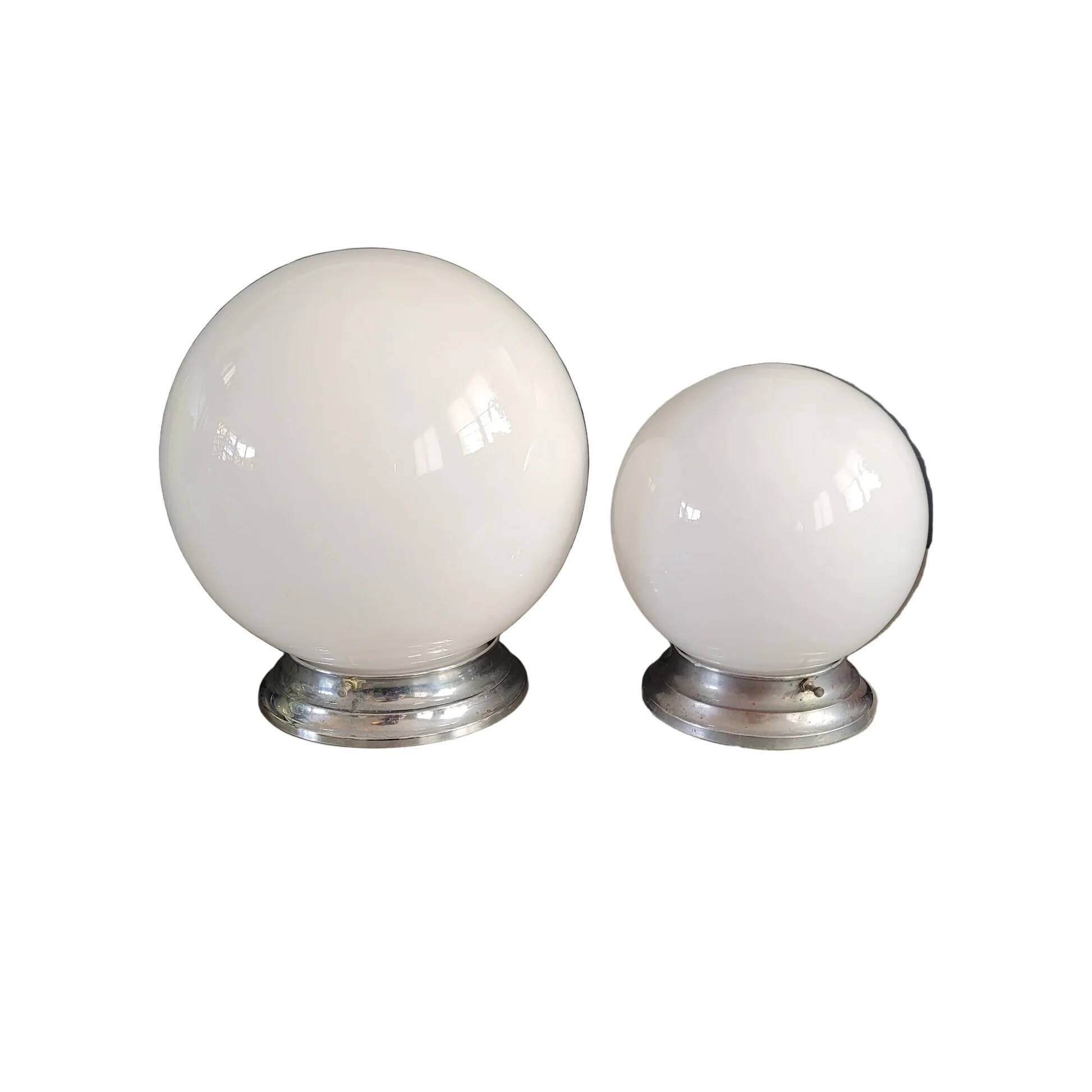 Pair of ceiling lights or wall lights with white glass globes.