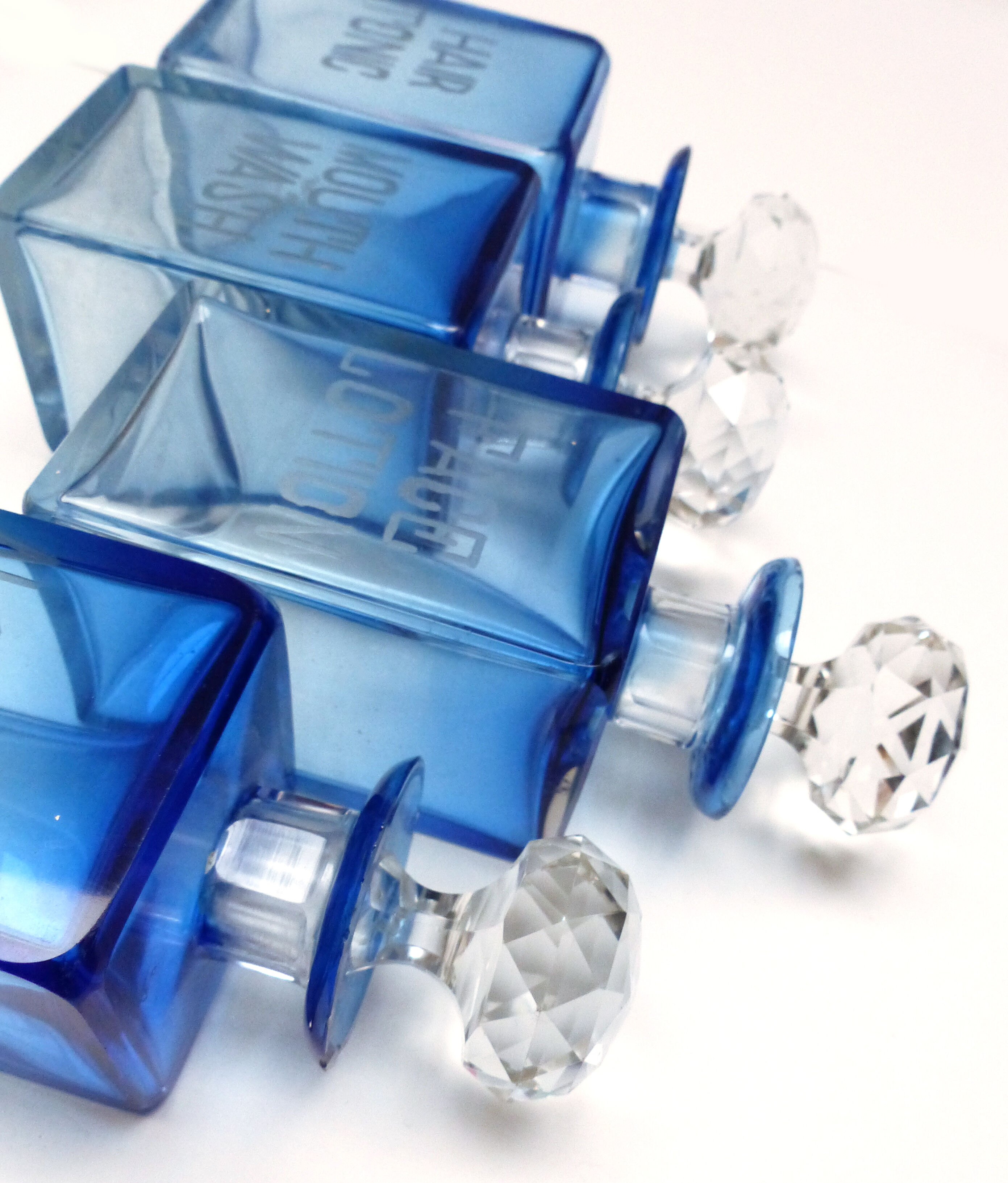 Set of 5 sapphire blue Bohemian crystal toilet bottles.