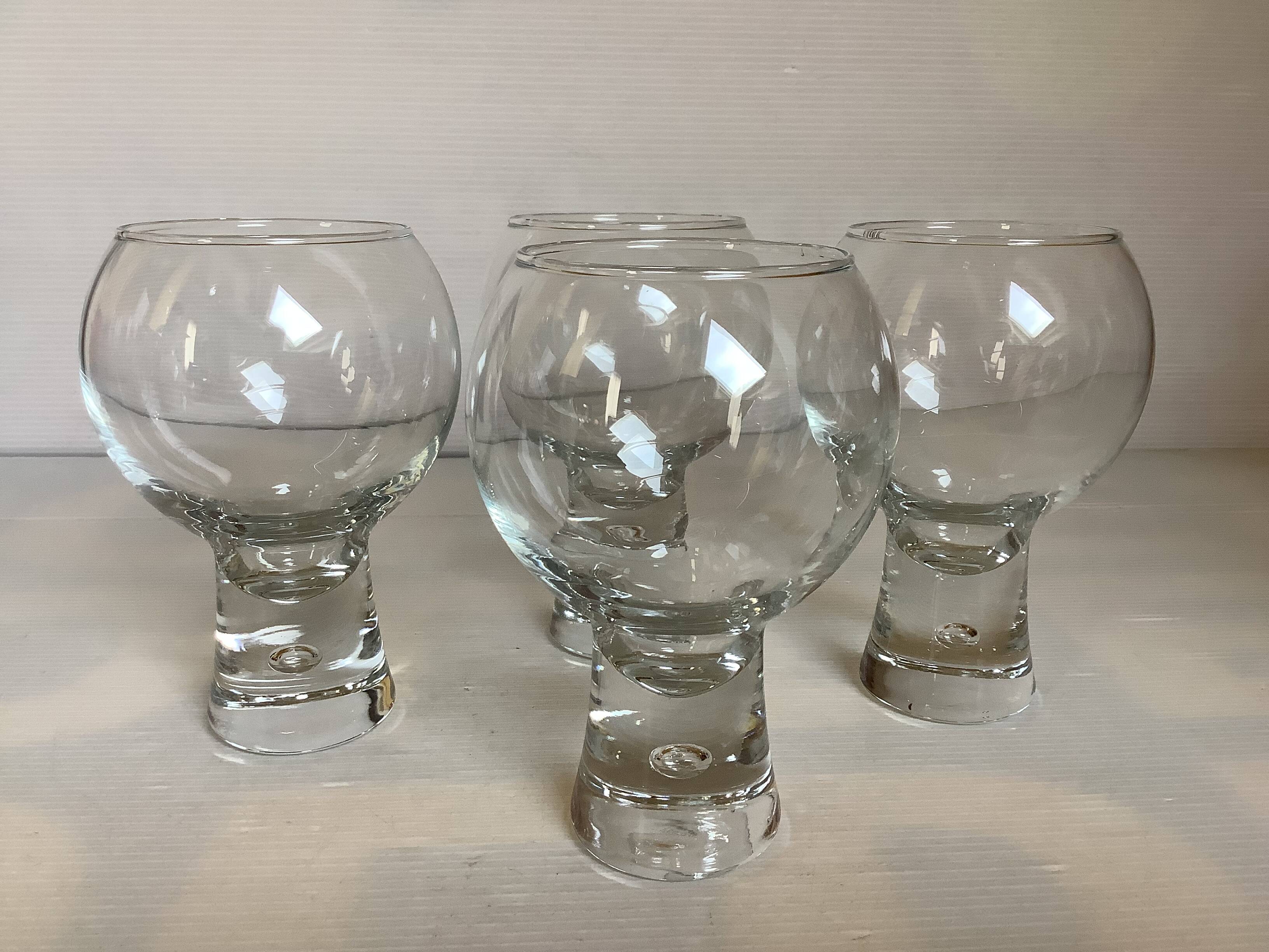 Four large bubble-style glasses by Kosta Boda.