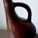 Rare and old dark brown pot-bellied jug. Made in Cuba
