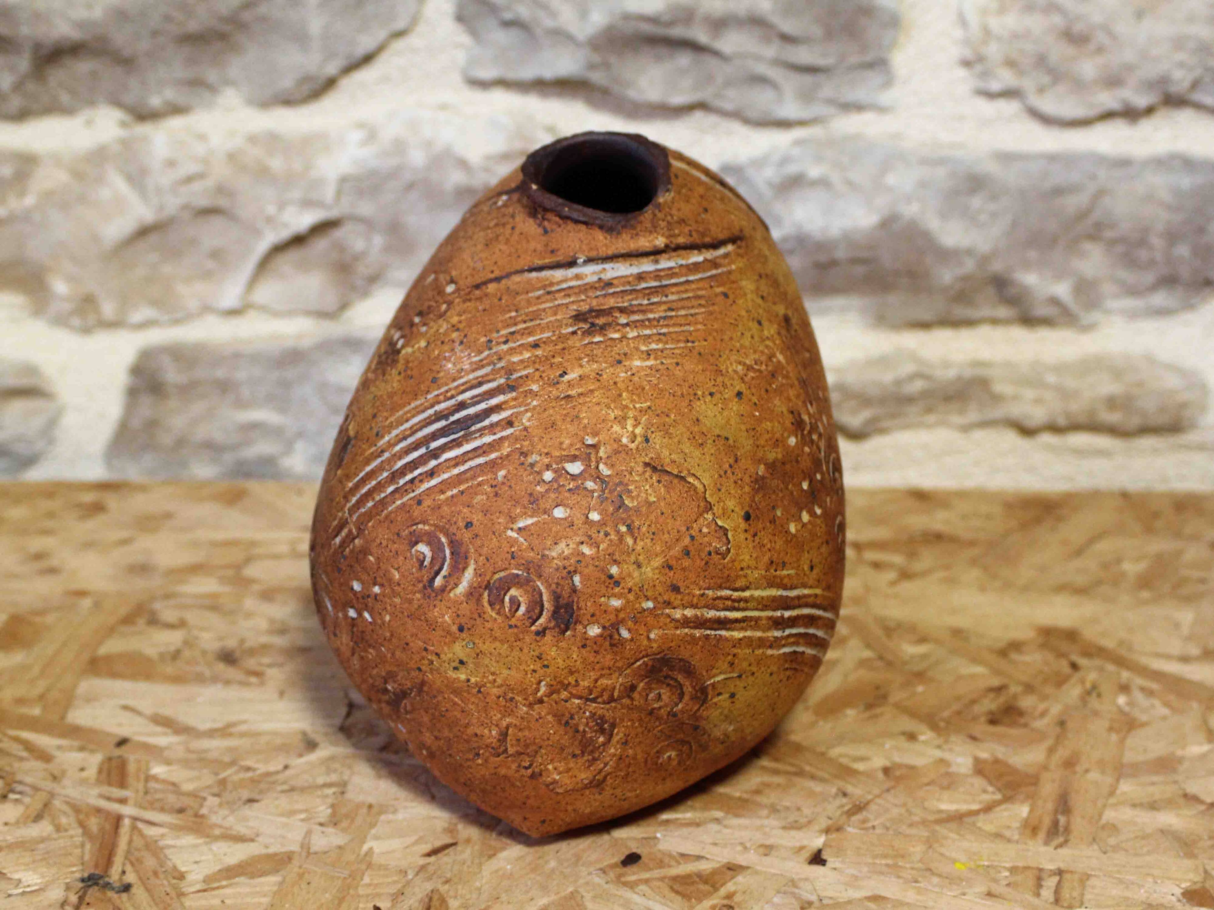 Stoneware vase with incised decoration