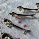 Set of 6 silver metal dachshund knife rests