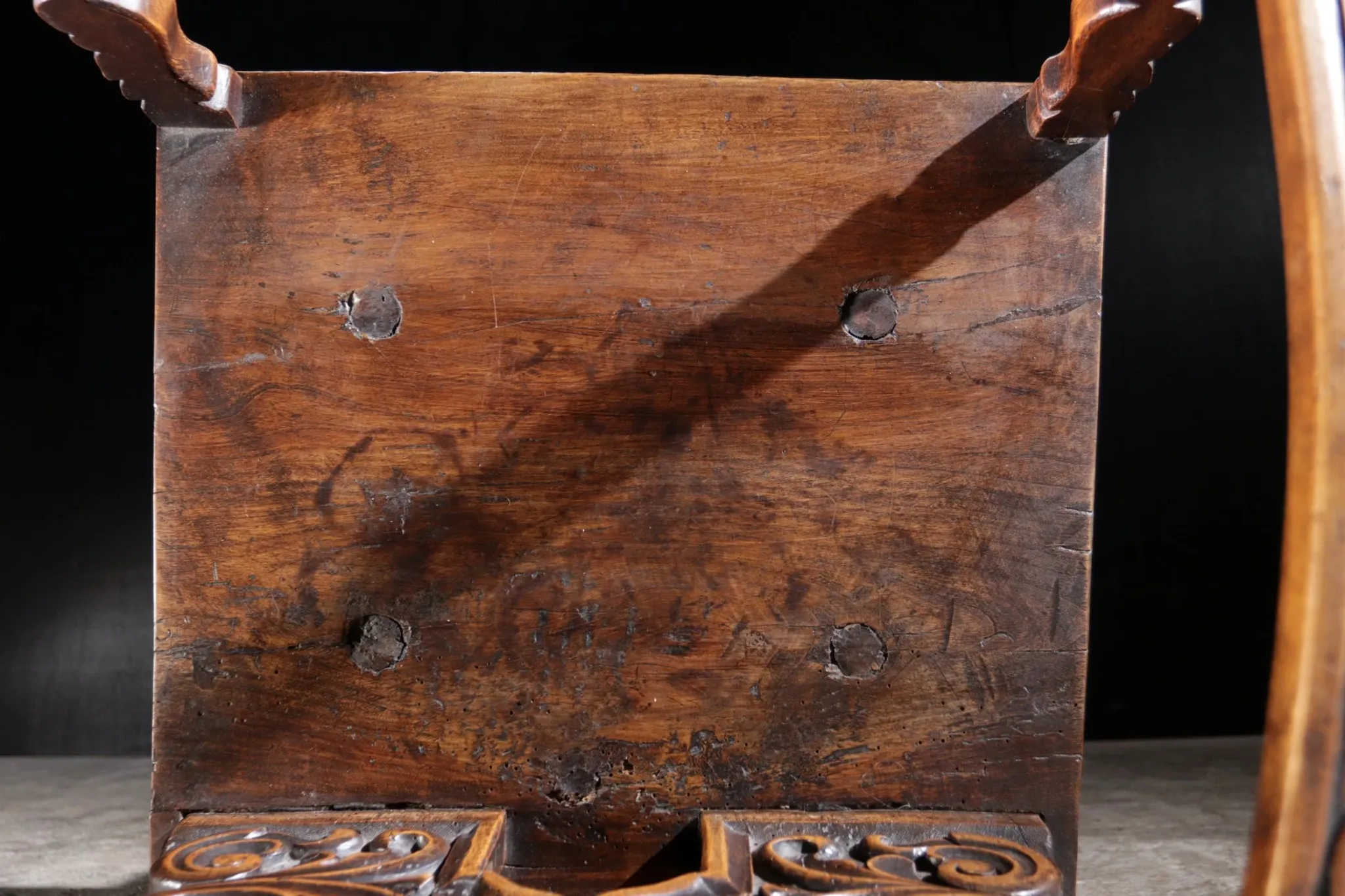 17th century Alpine carved walnut Brettstuhl armchair with grotesque mask