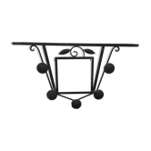 Wrought iron coat rack.