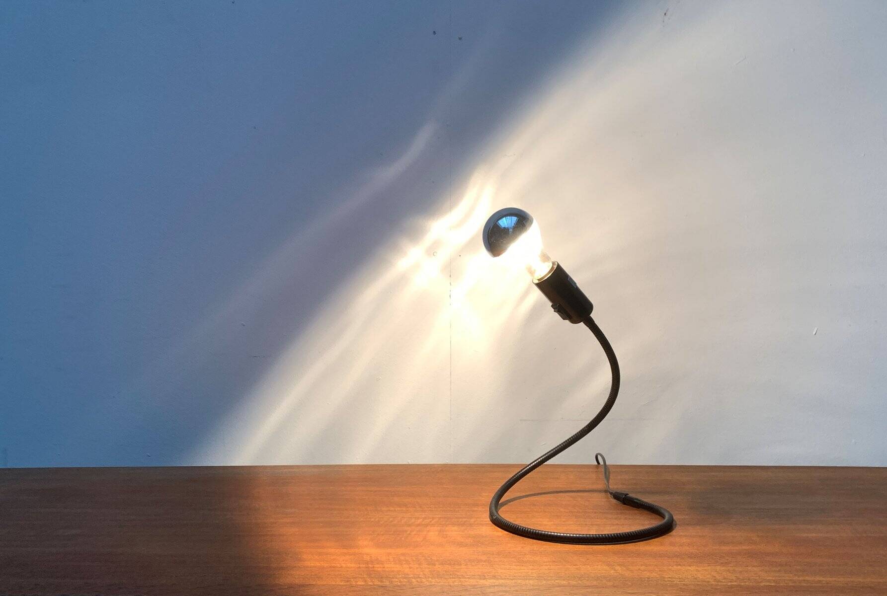 Lightworm minimalist table lamp by Walter Schnepel for Tecnolumen.