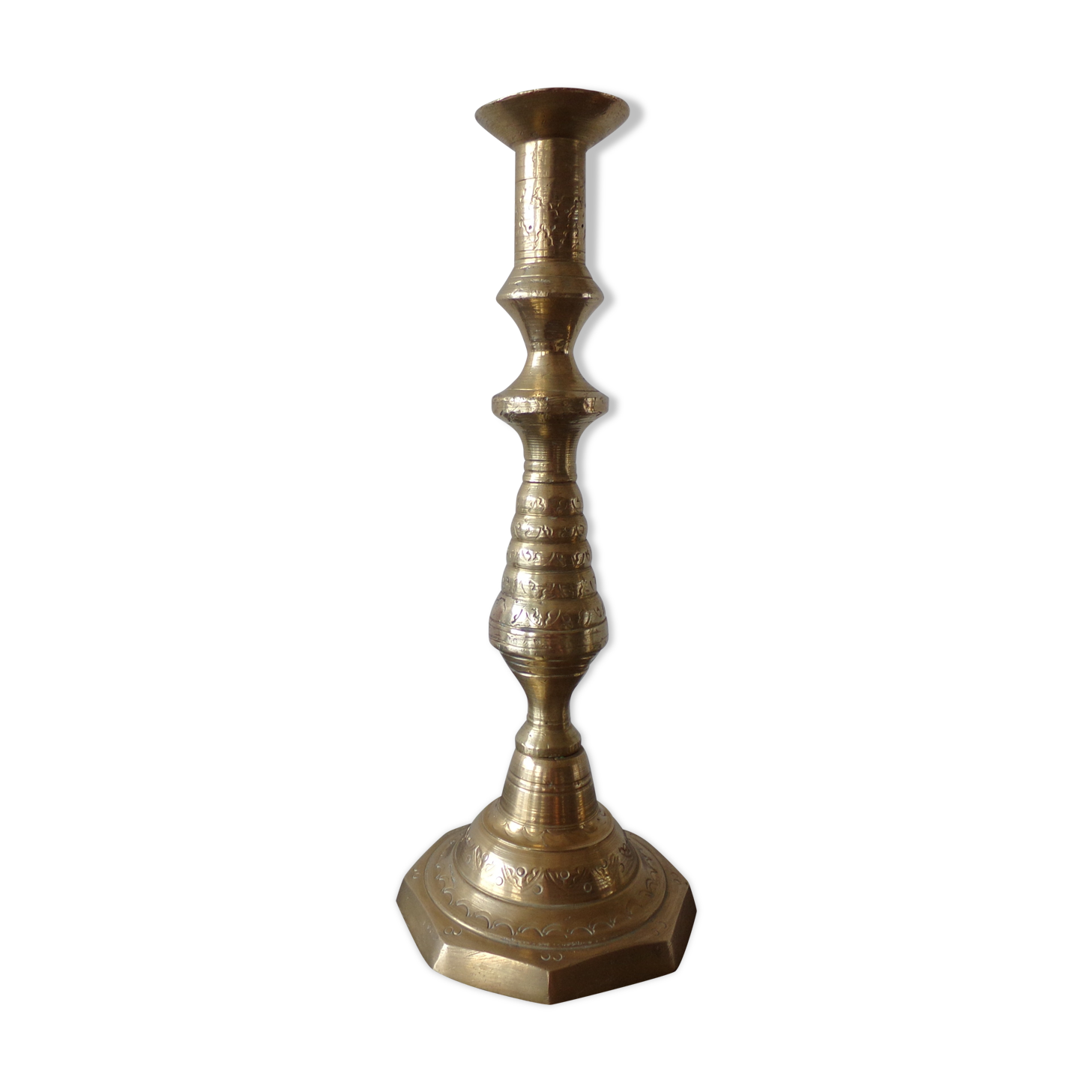 Old candle holder in gilded bronze