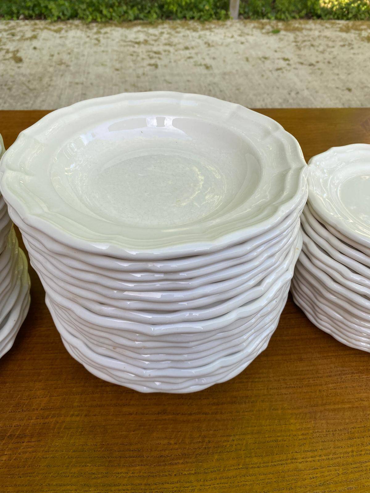 Service of 84 vintage white porcelain plates.