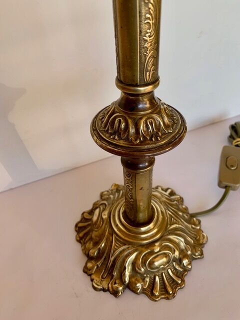 Ancient lamp on foot