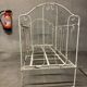 Old vintage wrought iron bench bed