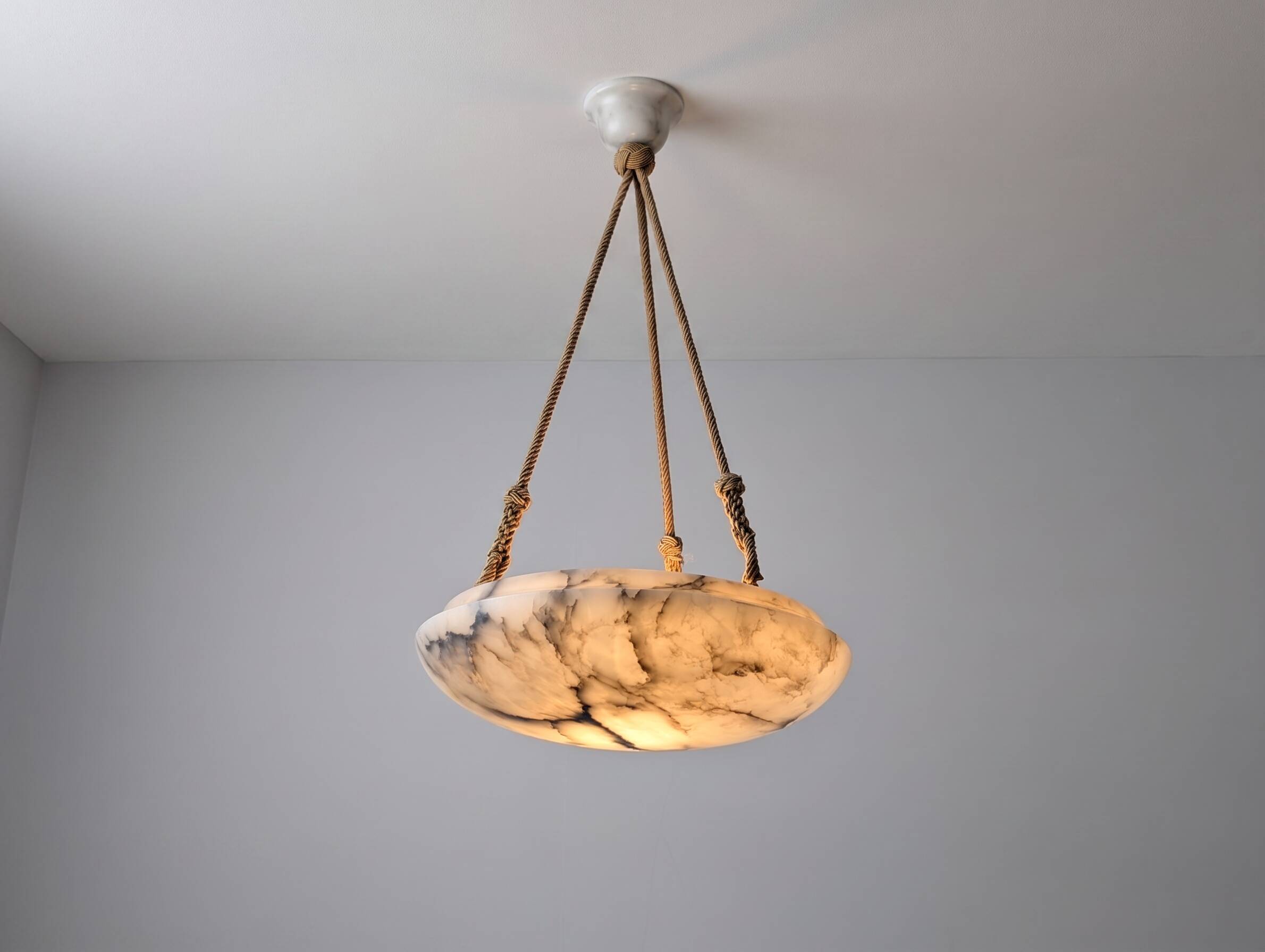Timeless Art Deco pendant lamp in carved alabaster with black veins, 1920s