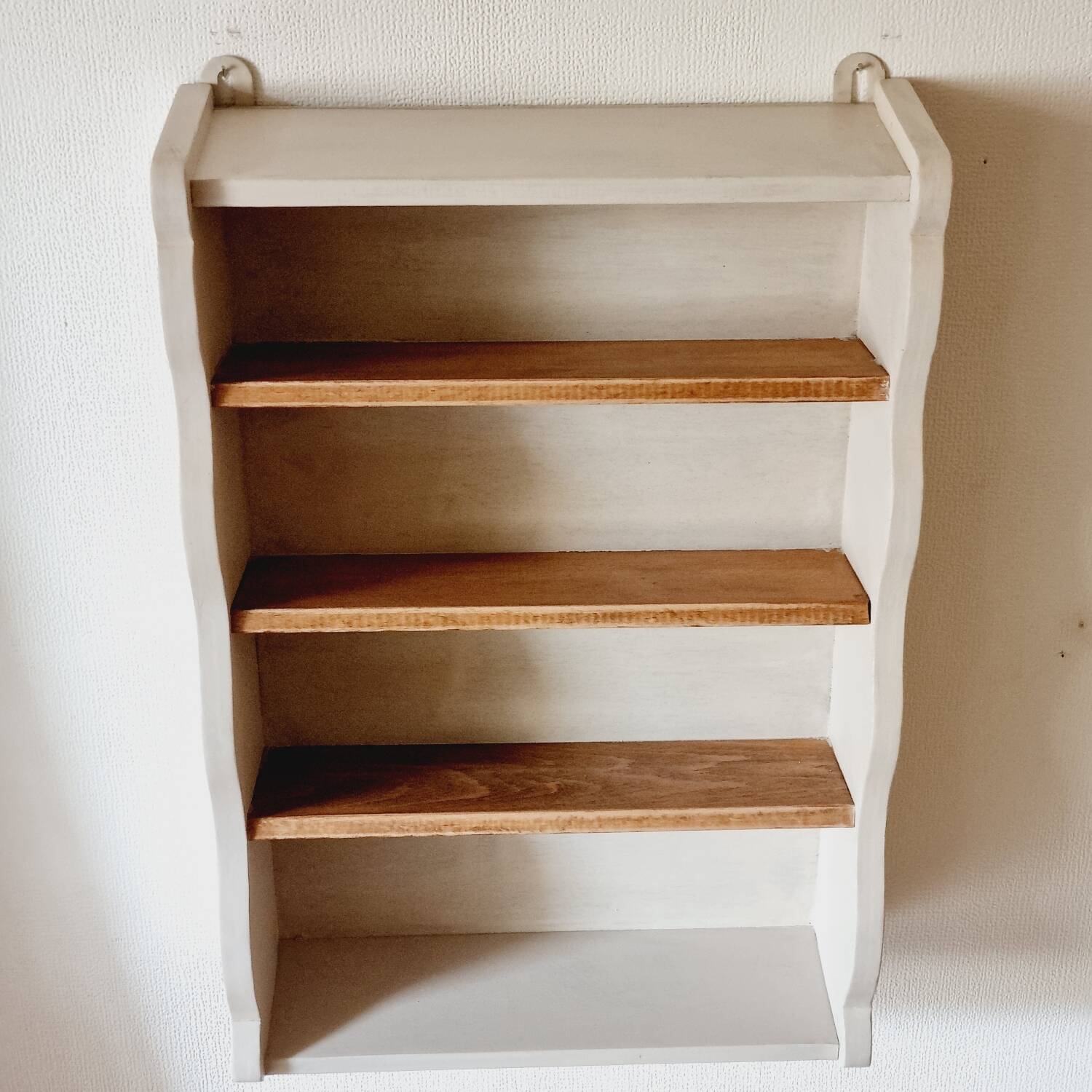 Linen-colored wooden shelf