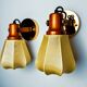 Pair of articulated "Cocoon" wall lights in resin and pine, Italy, 1970