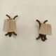 Paire d'appliques en rotin