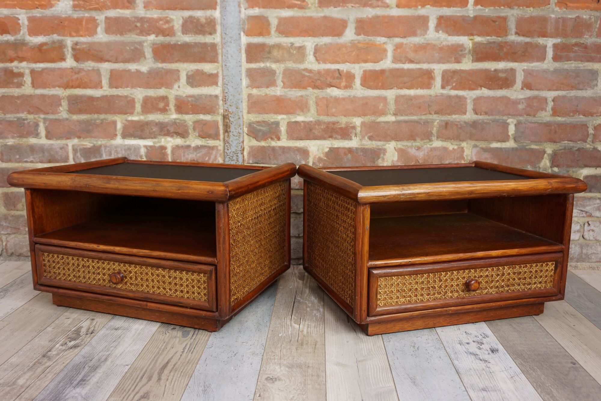 Pair of wooden bedside tables, rattan, canning and faux black leather