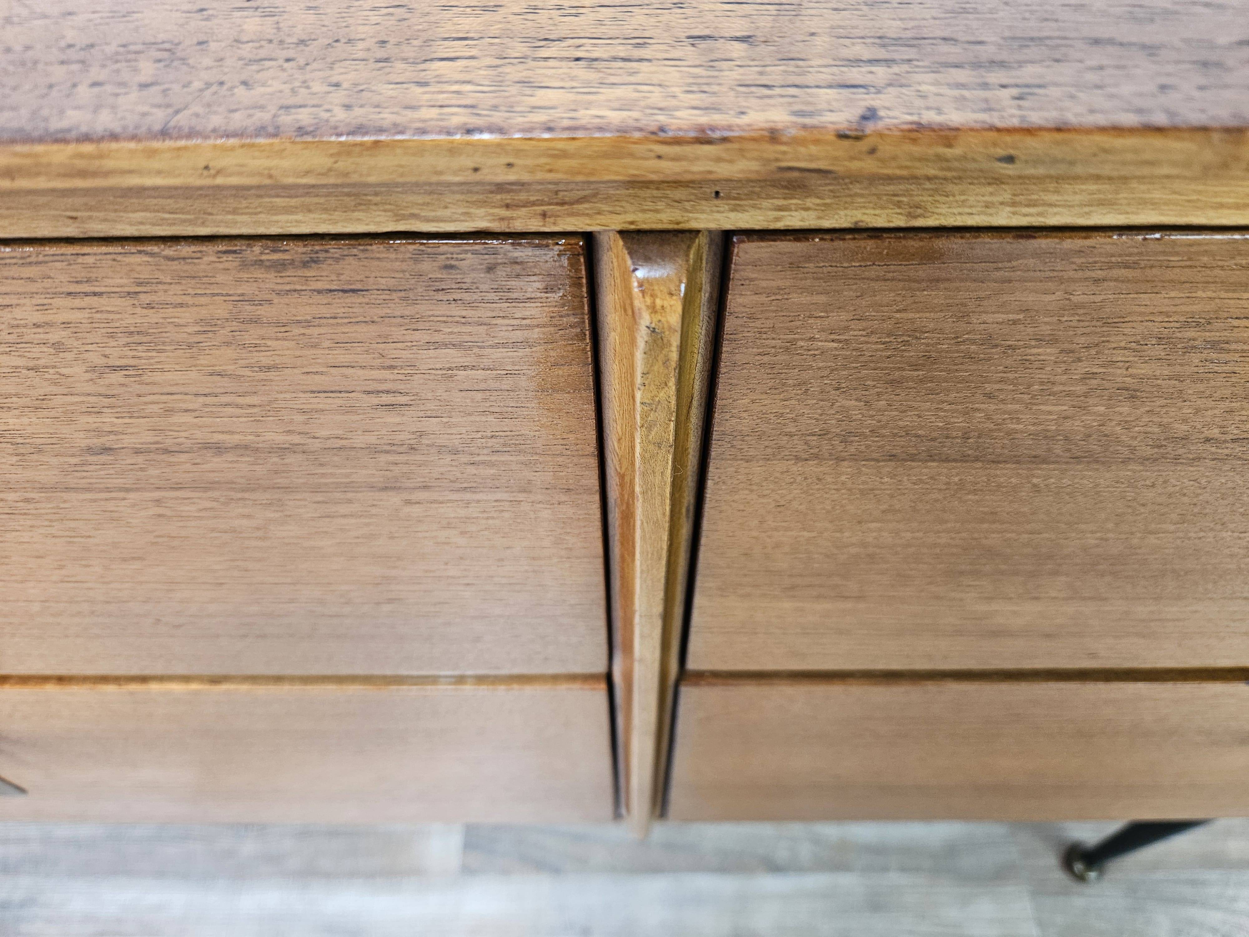 1960s walnut chest of drawers with iron and brass details