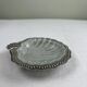 Shell-shaped catch-all tray