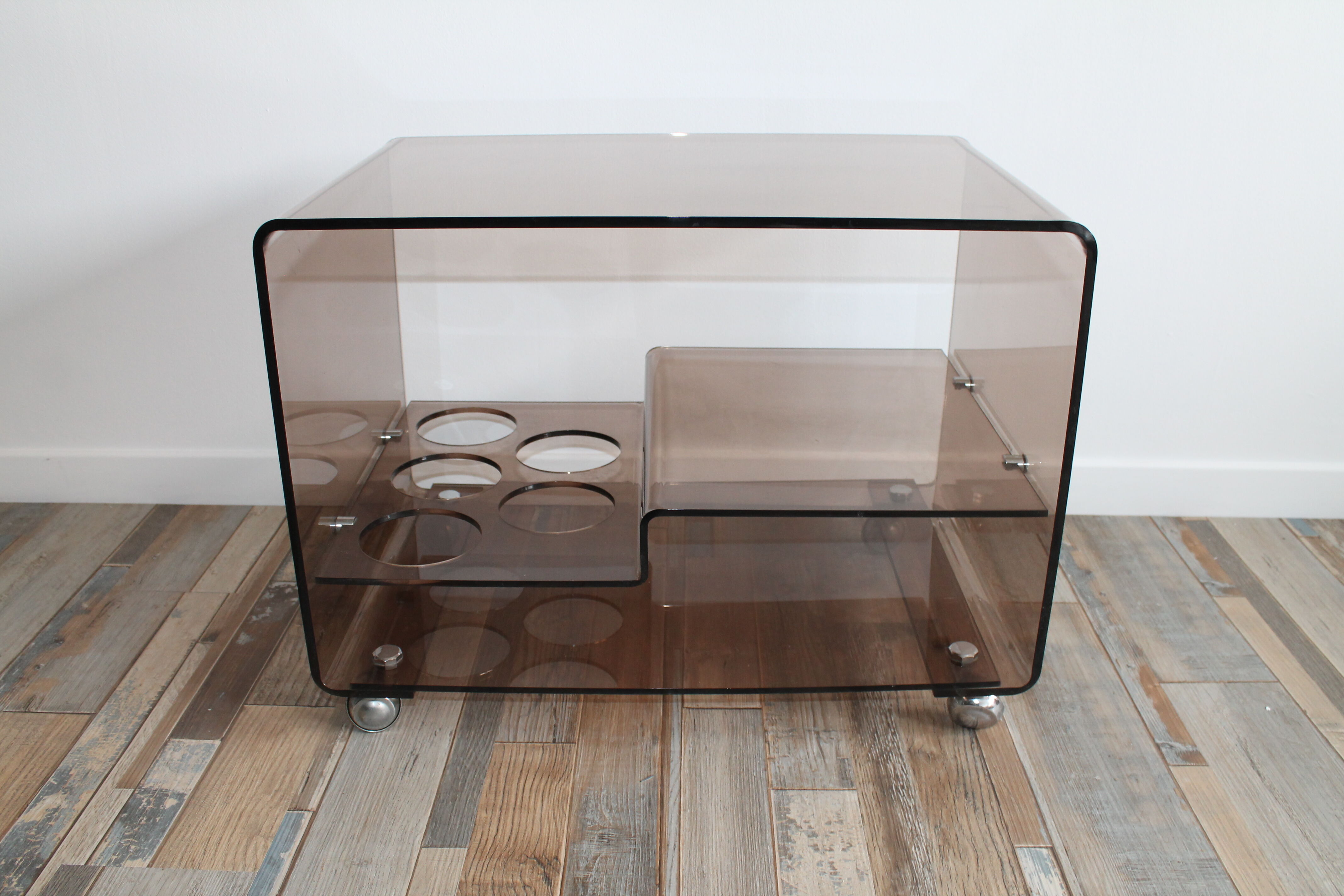 Low table served on wheels by Michel Dumas in vintage 1970 smoky Plexiglas