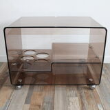 Table basse desserte sur roulettes par Michel Dumas en plexiglas fumé vintage 1970