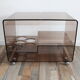 Low table served on wheels by Michel Dumas in vintage 1970 smoky Plexiglas